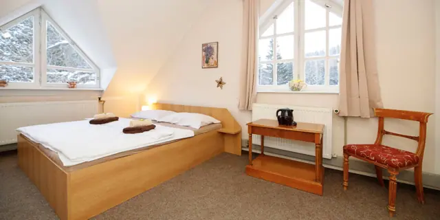 Malebná roubenka s polopenzí na okraji Harrachova